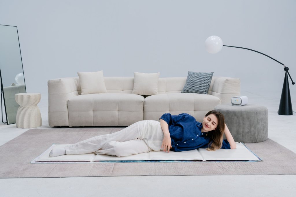 Lie on the Magic Pro Mat on the Floor